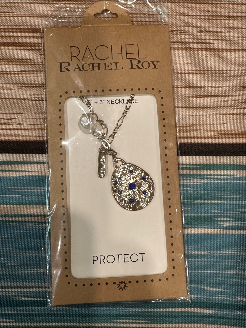 RACHEL Rachel Roy Gold Teardrop Pendant Necklace with Blue Accents & a pearl